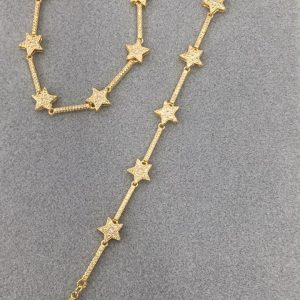 Brazalete estrella con zirconias dorado