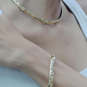 Set de chocker y brazalate Dorado.